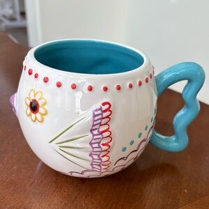 Colorful Ceramic Fish Mug with Floral Design